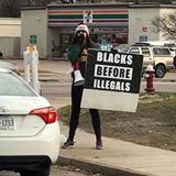 Scott Presler
              with protest sign: Blacks before illegals!